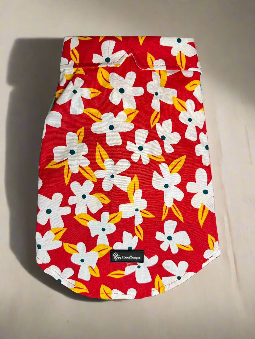 Red dog shirt with white floral pattern 